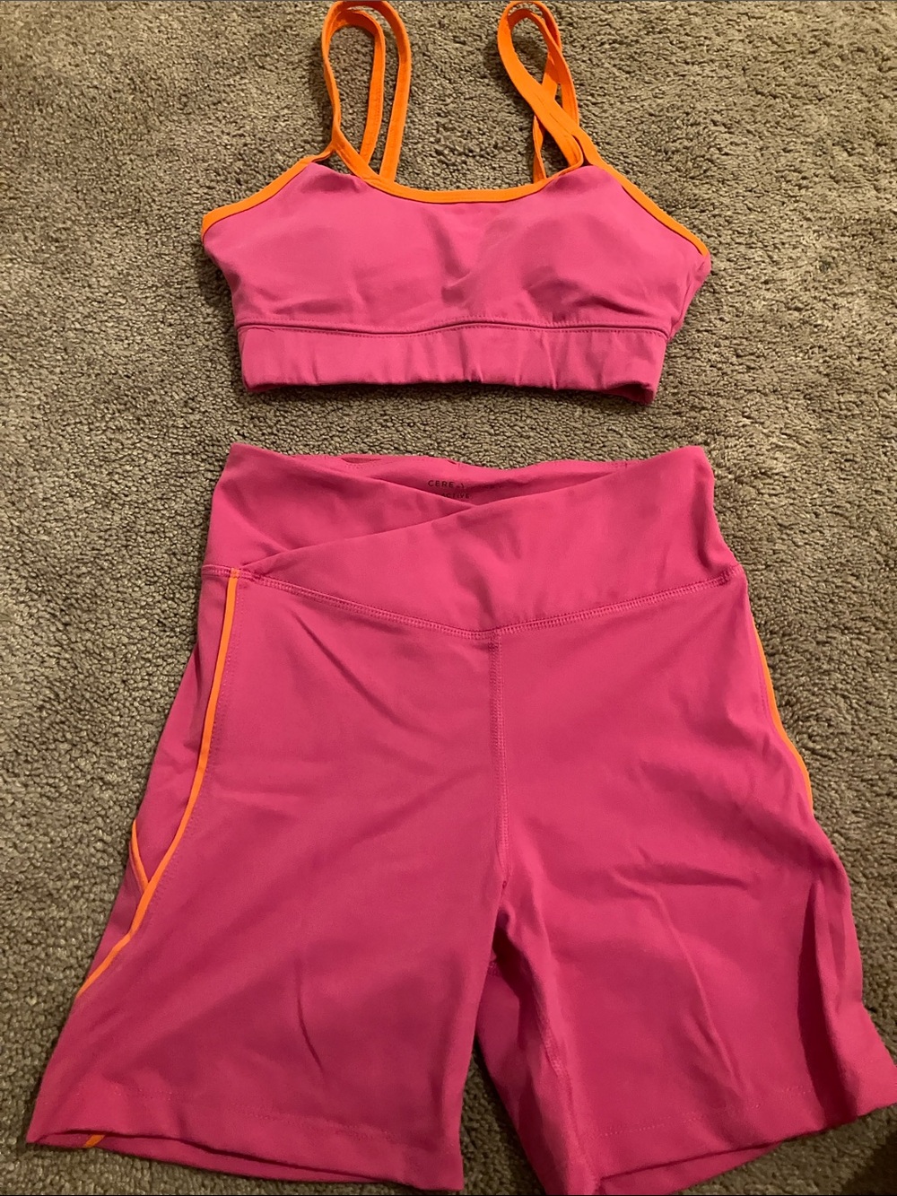 Hot pink and orange workout set.